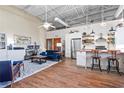 Open floor plan showcasing a seamless blend of living, dining, and kitchen areas, perfect for modern living at 5097 Peachtree Rd # I, Atlanta, GA 30341
