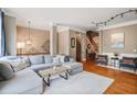 Spacious living room with hardwood floors, a sectional sofa, and stylish decor at 1040 Emory Parc Pl, Decatur, GA 30033