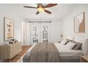 Spacious main bedroom with double doors leading to a private outdoor space at 1445 Monroe Ne Dr # F10, Atlanta, GA 30324