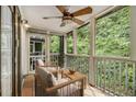 Enjoy nature in this screened porch, a tranquil space perfect for relaxation at 1445 Monroe Ne Dr # F10, Atlanta, GA 30324