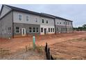 New construction townhomes with brick exteriors and multiple windows for natural light at 3102 Marbella Cir # 1, Kennesaw, GA 30152