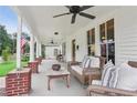 Inviting front porch with comfortable seating, offering a relaxing outdoor space with nice columns at 27 Sessions Nw St, Marietta, GA 30060