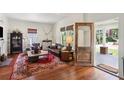Cozy living room with hardwood floors, stylish decor, and ample natural light at 27 Sessions Nw St, Marietta, GA 30060
