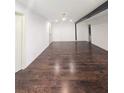 Spacious living room featuring hardwood floors and neutral walls at 2821 Ne Meadowlark Trail, Duluth, GA 30096