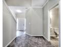 Welcoming foyer with new flooring, complemented by an adjacent powder room, enhancing the home's functionality and style at 335 Melody Ne Ln, Cartersville, GA 30121