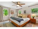 Bright bedroom with large windows, a ceiling fan, and neutral decor at 3349 Concord Se Cir, Smyrna, GA 30080