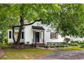 Inviting one-story home with a well-maintained lawn and mature trees offering a picturesque setting at 1981 N Decatur Ne Rd, Atlanta, GA 30307