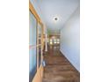 Inviting entryway with wood-look floors and a light-filled view through to the living area at 96 Lexie Ct, Rockmart, GA 30153