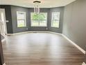 Bright living room with hardwood floors, recessed lighting and lots of windows at 2615 Fox Hall South Ln, Atlanta, GA 30349