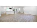 Bright and airy open-concept living space showcasing sleek floors and ample natural light at 2975 Rollingwood Se Ln, Atlanta, GA 30316