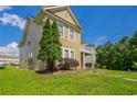 Charming two-story home featuring a well-kept lawn and inviting architecture, ideal for Gathering living at 4567 Parkway Cir, Atlanta, GA 30349