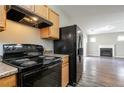 A well-equipped kitchen with modern appliances and granite countertops at 4634 Garden Hills Dr, Stone Mountain, GA 30083