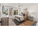 Bright bedroom featuring neutral colors, hardwood floors, and large windows with natural light at 1237 Memorial Se Dr # 303, Atlanta, GA 30316
