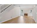 Bright living room featuring a fireplace and an open layout at 484 Culberson Sw St, Atlanta, GA 30310