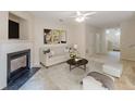 Inviting living room featuring a fireplace, neutral decor, and an open floor plan that is perfect for entertaining at 768 Nehemiah Sw Ln, Atlanta, GA 30331