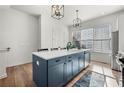 Kitchen with a central island provides ample counter space for cooking and entertaining at 720 Perch Pl, Atlanta, GA 30312
