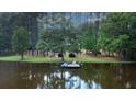 Private lake access with a charming dock and room for boats at 3140 Thoreau Ct, Loganville, GA 30052