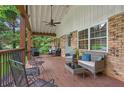 Relaxing covered front porch with ample seating, perfect for enjoying the outdoors at 3510 Dunn Se St, Smyrna, GA 30080