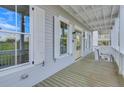 Balcony features classic white railings and exterior lights at 1294 Six Sisters St, Dacula, GA 30019