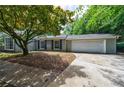 View of the home featuring an attached garage at 135 Pheasant Se Dr, Marietta, GA 30067