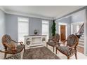 Cozy living room with neutral paint, zebra print chairs, and abundant natural light at 1870 Milfield Cir, Snellville, GA 30078