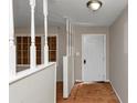 Entryway featuring white walls, stairs, and a light fixture at 2767 Kathie Ln, Ellenwood, GA 30294