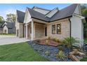Charming brick home with a well-manicured lawn, stylish landscaping, and inviting entrance at 863 N Bay Overlook, Villa Rica, GA 30180