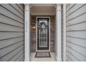 Charming front entrance with stone accents, decorative wreath, and a welcoming ambiance at 2294 Spicy Pine Ln, Lawrenceville, GA 30044
