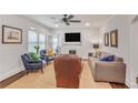 Bright and inviting living room featuring large windows and cozy furniture at 728 Antone Nw St, Atlanta, GA 30318