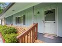 Inviting front porch with brick accents, offering a warm welcome to guests at 1960 Oak Leaf Sw Ct, Marietta, GA 30008