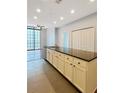 Open kitchen boasts a large island with sink and countertop space, perfect for entertaining and meal preparation at 3040 Peachtree Nw Rd # 1501, Atlanta, GA 30305