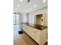 Interior laundry room featuring stacked appliances for convenience at 3040 Peachtree Nw Rd # 1501, Atlanta, GA 30305