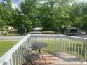 Cozy balcony with a table and chairs, perfect for enjoying outdoor space at 6701 Knollwood Cir, Douglasville, GA 30135