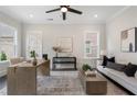 Spacious home office featuring natural light, modern decor, and a comfortable seating area at 912 Sunny Meadows Ln, Marietta, GA 30062