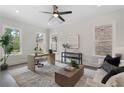 Bright home office features natural light, modern decor, and comfortable seating area at 912 Sunny Meadows Ln, Marietta, GA 30062