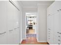 Hallway with ample closet space leading into the kitchen at 620 Peachtree Ne St # 1111, Atlanta, GA 30308