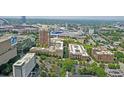 Panoramic aerial view showcasing the city skyline, surrounding greenery, and convenient urban living at 300 Peachtree Ne St # 14H, Atlanta, GA 30308