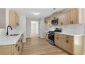 Modern kitchen featuring sleek countertops, stainless steel appliances, and stylish cabinetry at 8592 Hidden Creek Cir, Snellville, GA 30039