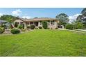 Lovely single-story home with a meticulously landscaped lawn at 2676 Abington Dr, Snellville, GA 30078