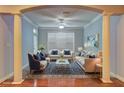Elegant living room with neutral sofas, a patterned rug, and bright, airy lighting at 1203 Stratford Commons Commons, Decatur, GA 30030