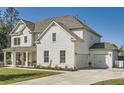 Charming home showcasing its side and back, complemented by a well-manicured lawn and a convenient attached garage at 6168 Sweet Birch Ct, Acworth, GA 30101
