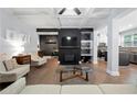 Bright living room with coffered ceilings, fireplace, and seamless open-concept design at 2069 Brightleaf Way # 123, Marietta, GA 30060