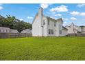 Expansive backyard featuring a lush lawn and privacy fence at 3822 River Ridge Ct, Decatur, GA 30034