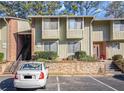 Inviting two-story condo with a mix of brick and siding at 2220 Runnymead Se Rdg, Marietta, GA 30067