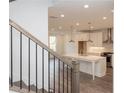 This is a kitchen with stainless steel appliances and a large island that is perfect for entertaining guests at 706 Dodd Ln # 157, Buford, GA 30518