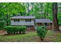 Quaint two-story home with traditional architecture and manicured front yard at 3294 Francine Dr, Decatur, GA 30033