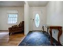 Inviting home entryway with unique stone flooring and decorative front door at 3294 Francine Dr, Decatur, GA 30033