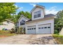 Charming two-story home with an attached two car garage and private drive at 4783 Creekside Pl, Decatur, GA 30035