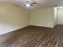 Spacious living room with hardwood floors perfect for entertaining at 2850 Cedar Trace Dr, Ellenwood, GA 30294