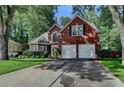 Beautiful brick home with a well-manicured lawn and two-car garage at 2633 Hanriva Ct, Dacula, GA 30019